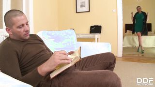 Busty British babe Yuffie Yulan footjobs and gets a load of cum on her feet