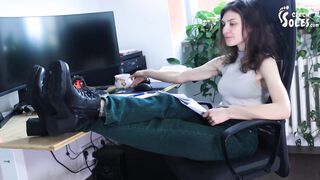 New model Andrea and her feet in the office